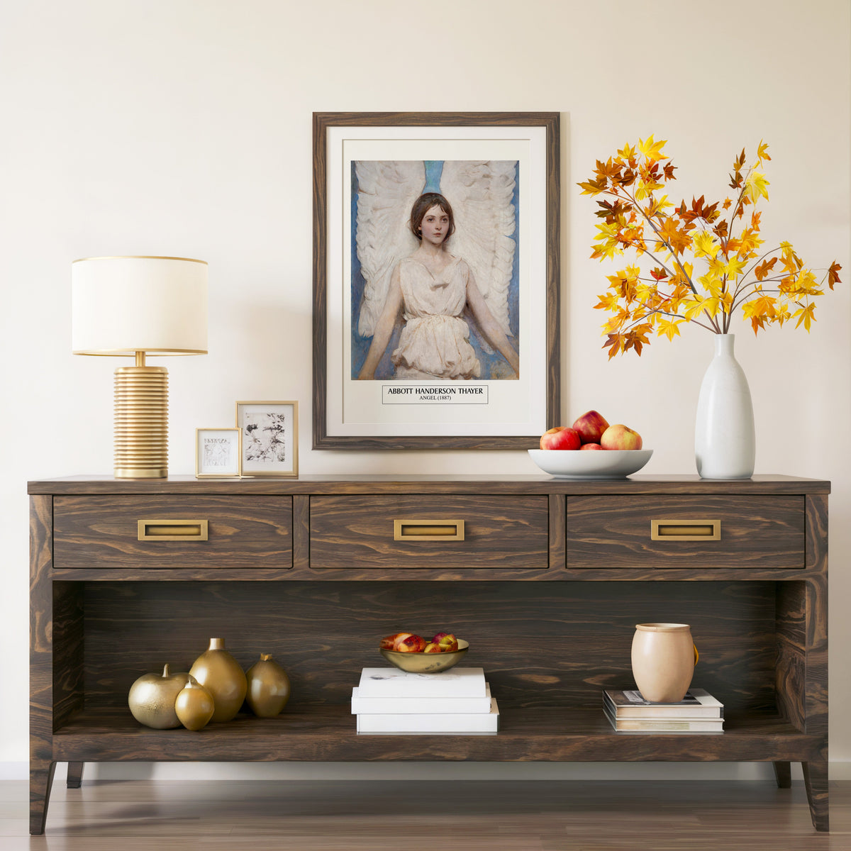 Thayer Angel print in a walnut frame above a console with autumn branches
