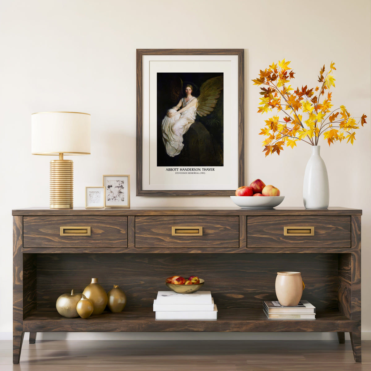 Thayer memorial print in a walnut frame above a console with autumn branches