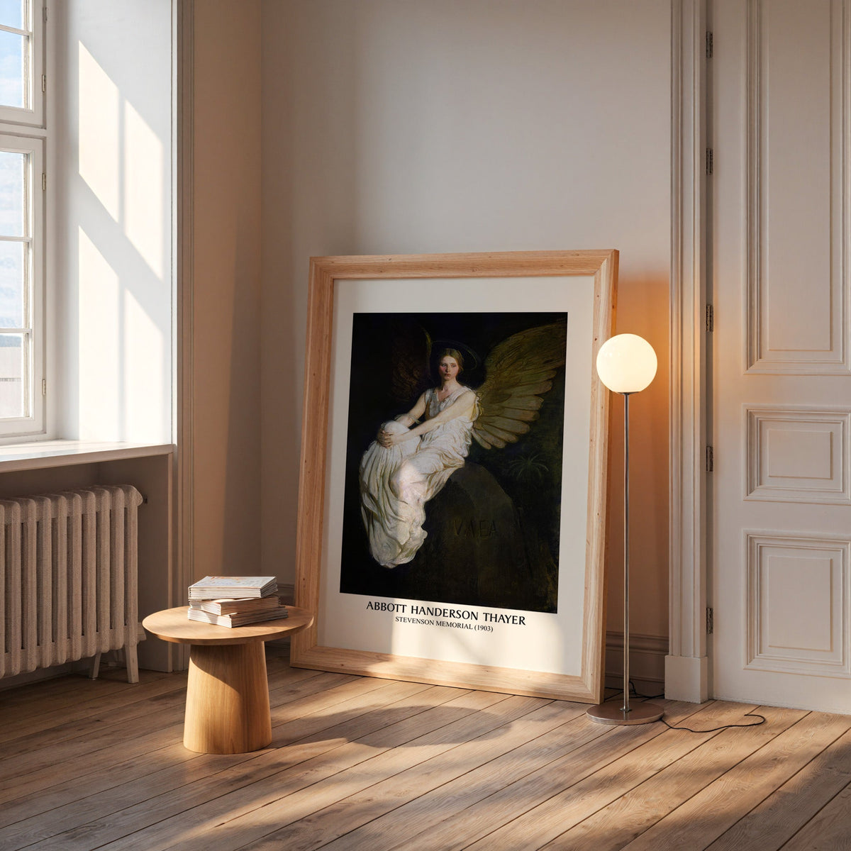 Stevenson Memorial print in a wide pine frame leaning by a sunlit window