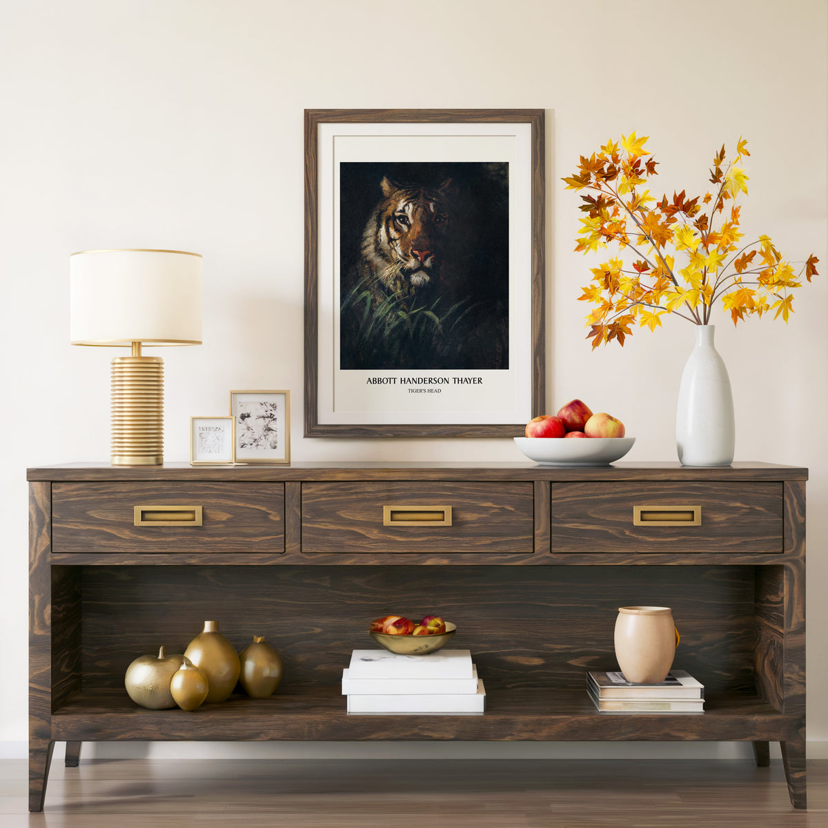 Thayer tiger print in a walnut frame above a console with autumn branches