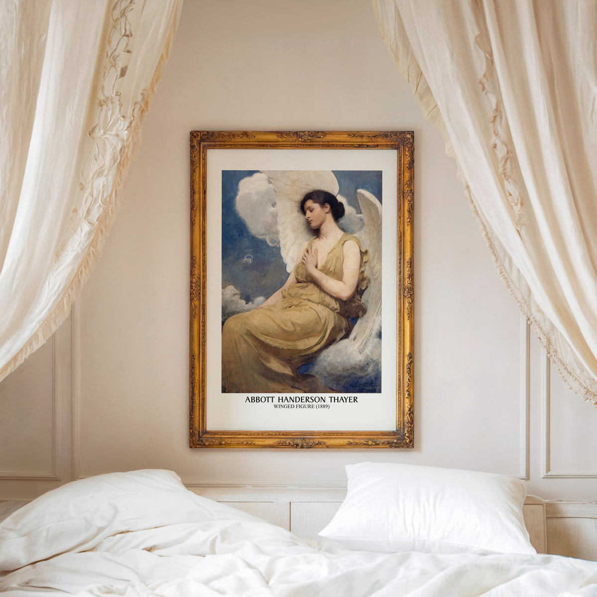 Winged Figure print shown in an ornate gold frame above a canopy bed