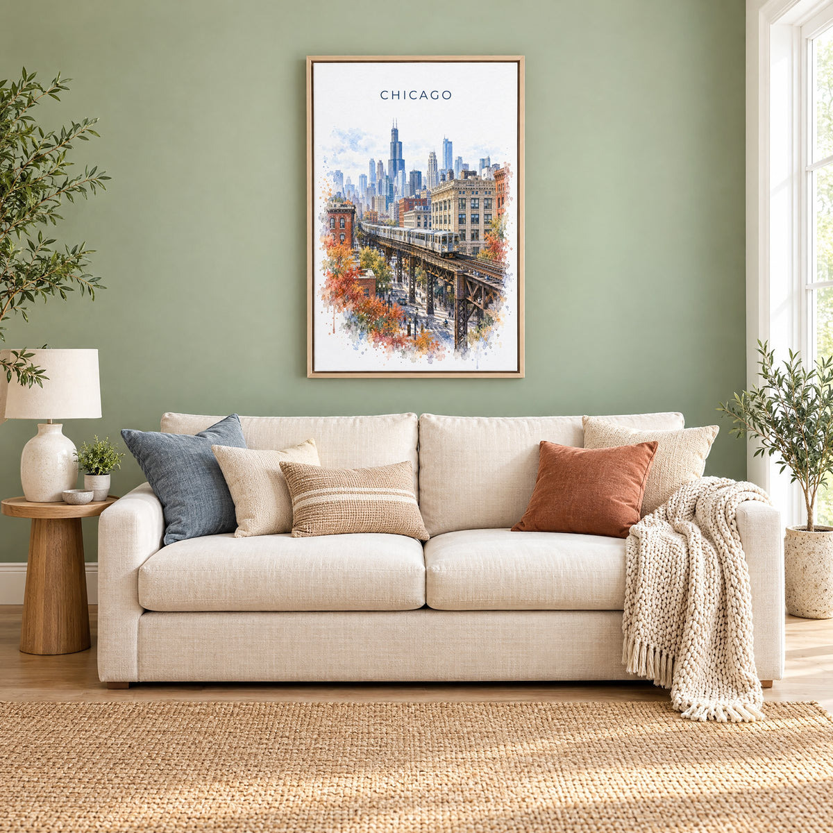 Chicago Loop watercolor print as a natural floater canvas above a cream linen sofa on a sage green wall