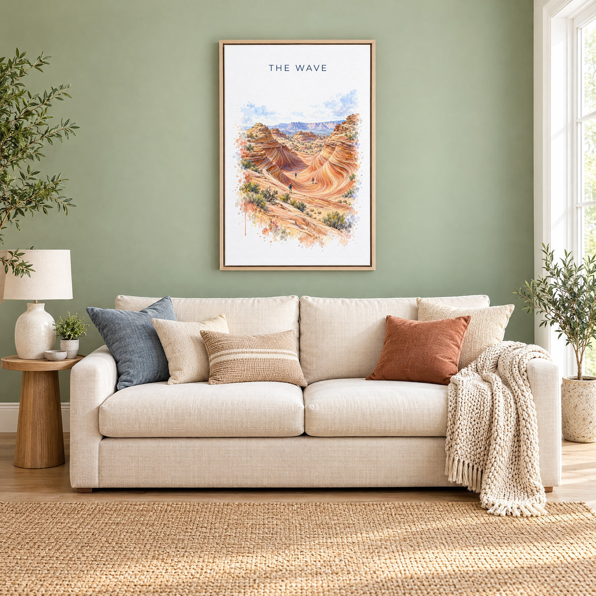 The Wave, Arizona watercolor print as a natural floater canvas above a cream linen sofa on a sage green wall