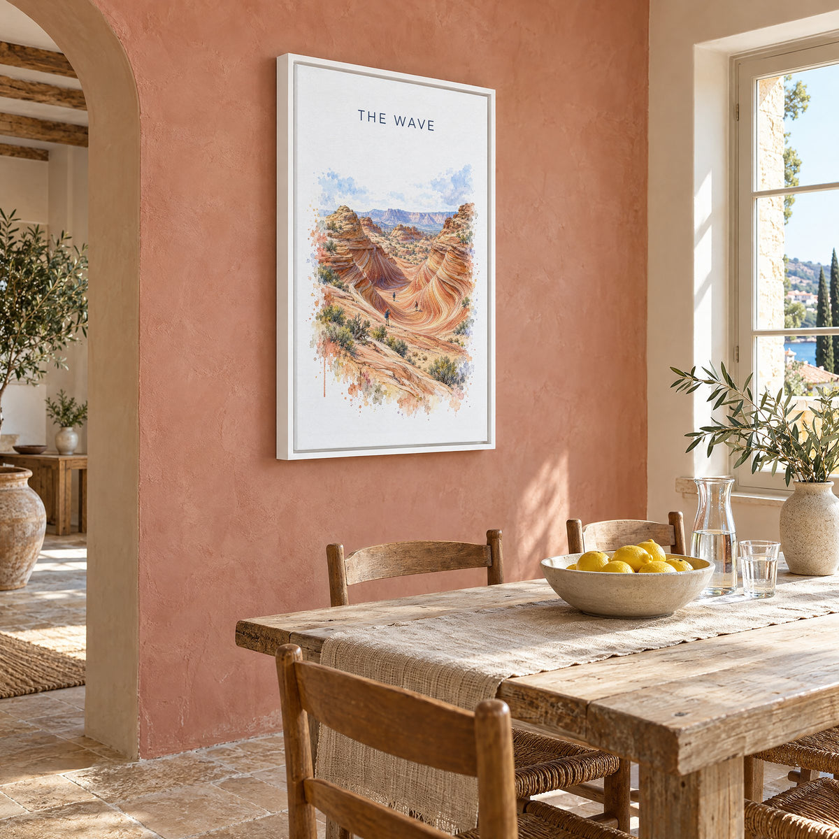 The Wave, Arizona watercolor print as a white floater canvas on a terracotta wall above a rustic dining table