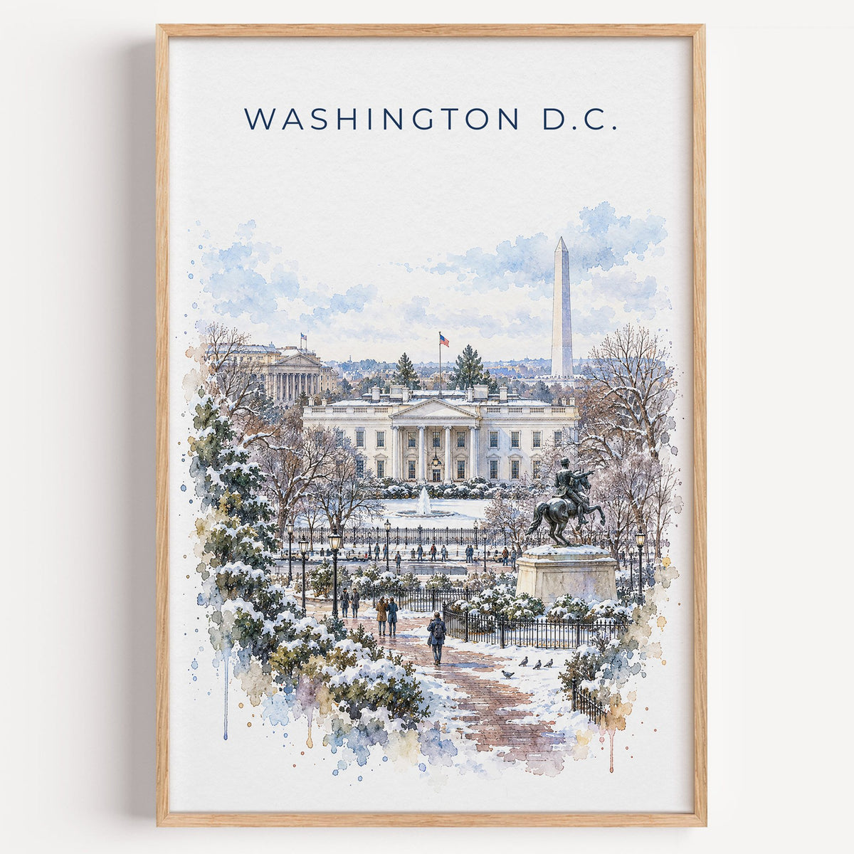 White House watercolor print in a light oak frame on a plain white wall