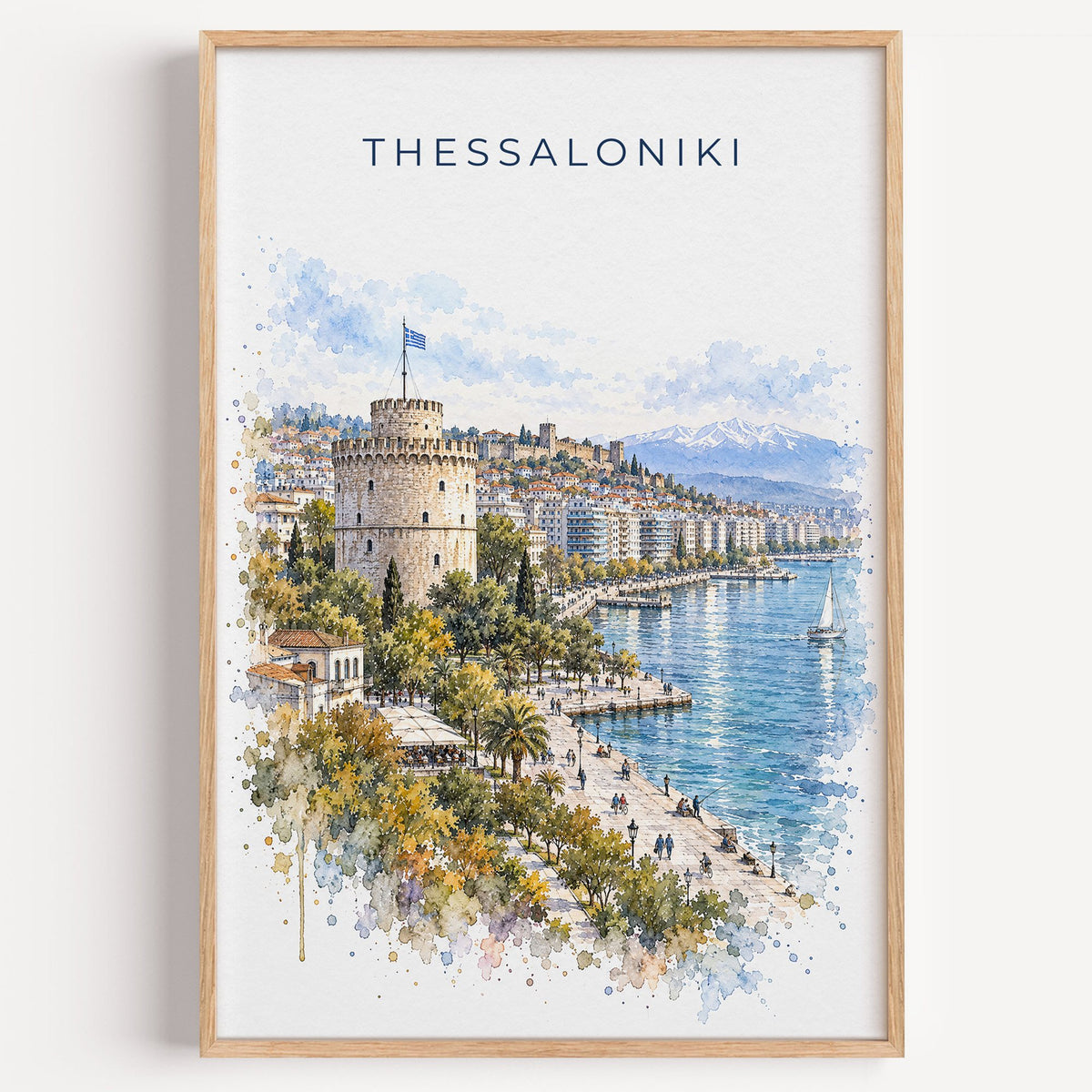 Thessaloniki watercolor print in a light oak frame on a plain white wall