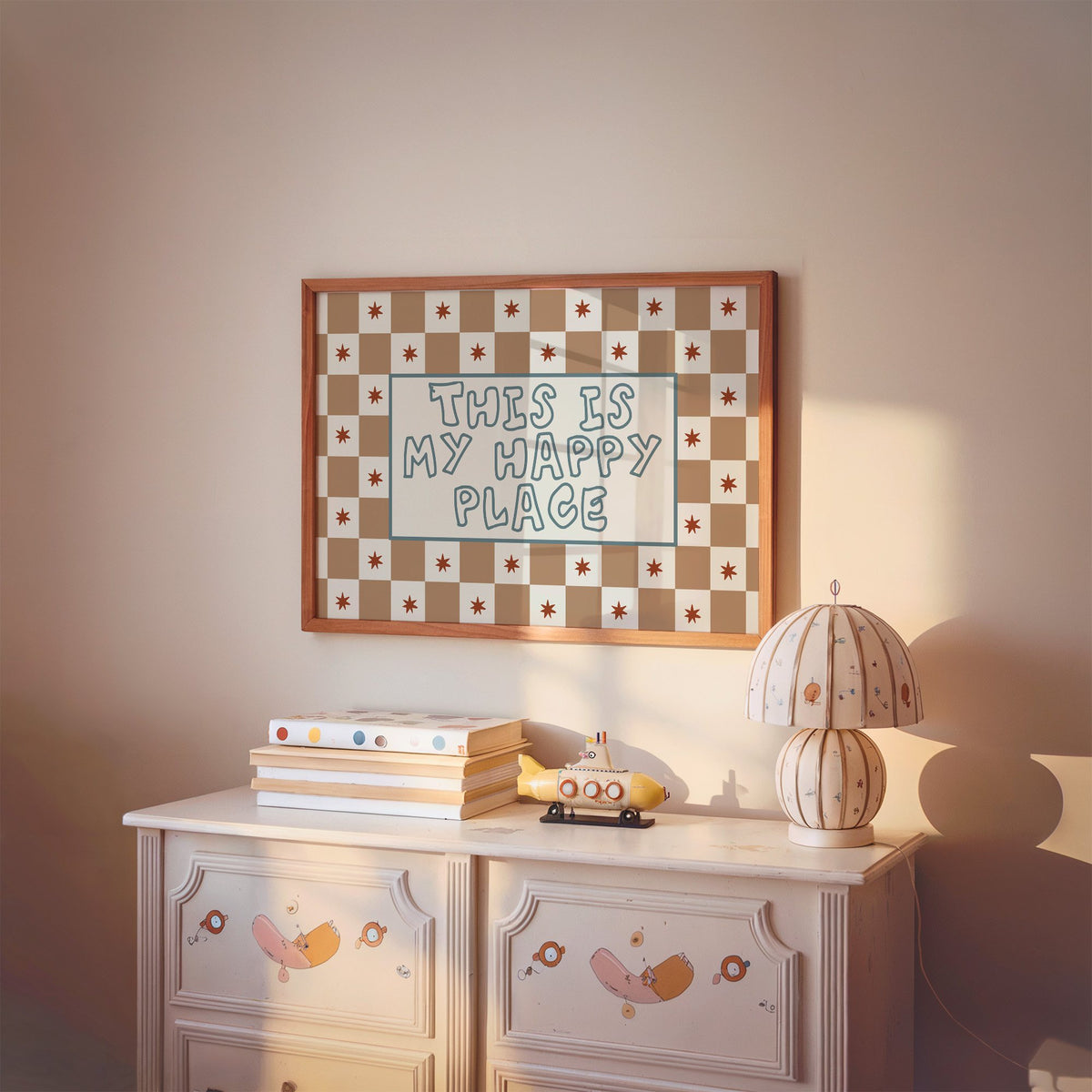 Landscape this is my happy place nursery print in a cherry wood frame above a painted dresser and lamp