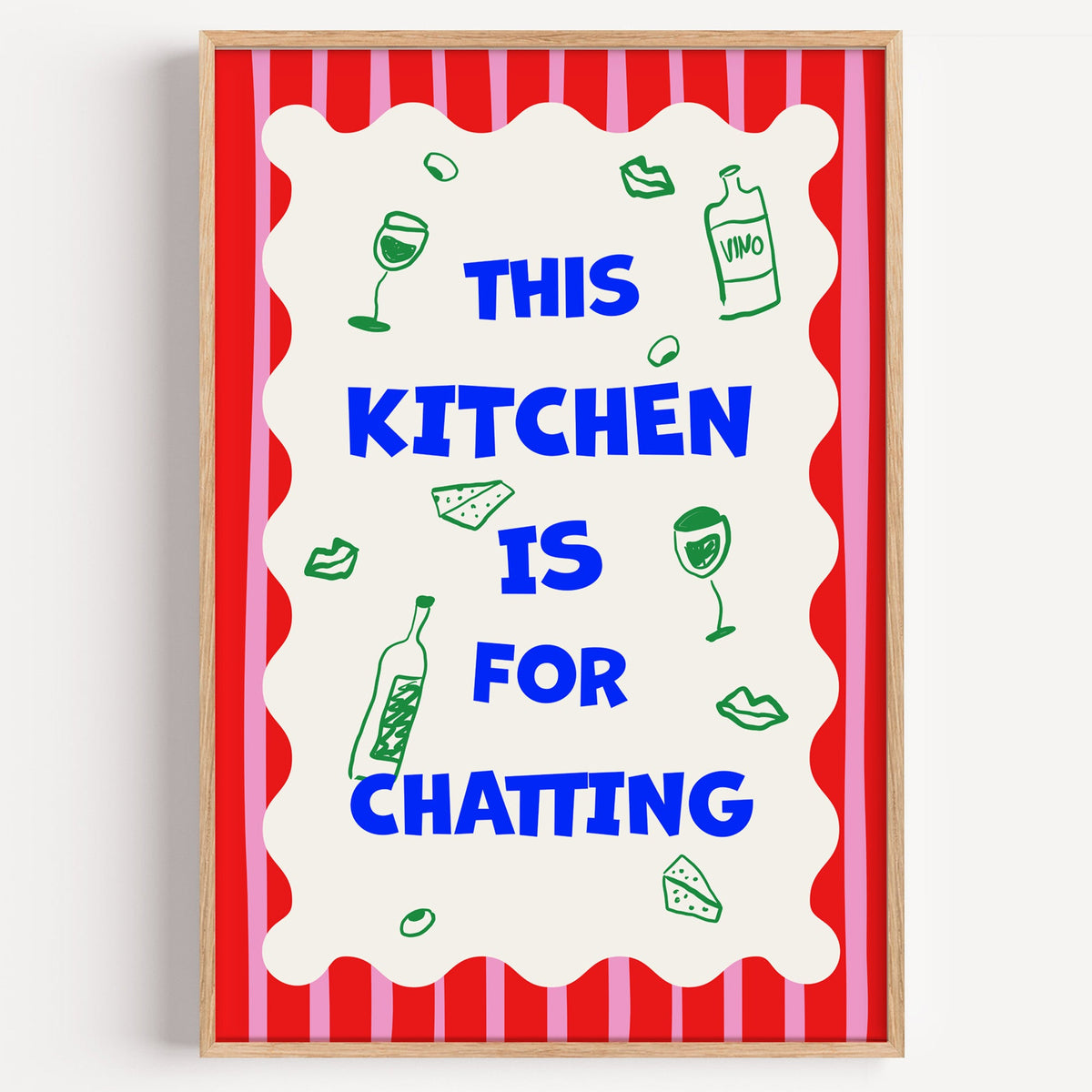 This kitchen is for chatting print in a light oak frame on a plain white wall