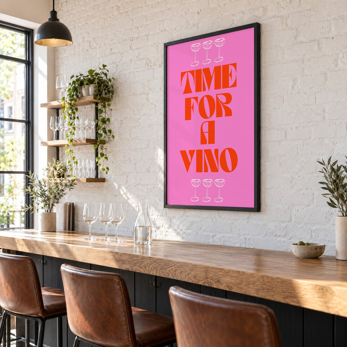 Time for a Vino pink coupes print in a black frame on a white brick wall above a wine bar counter