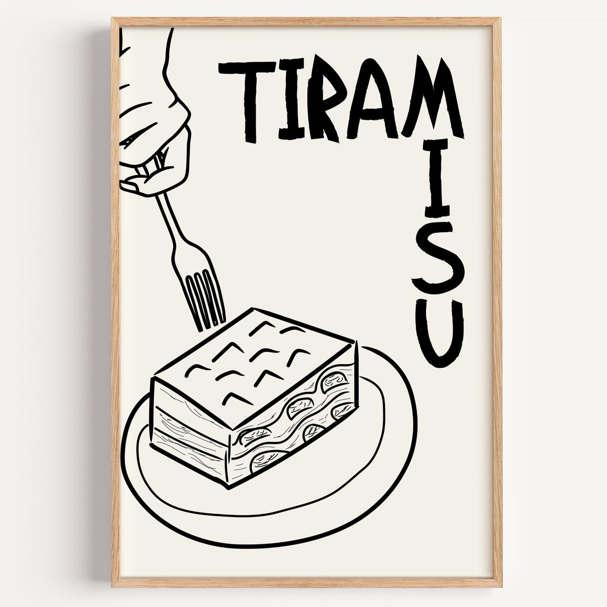 Tiramisu line art print in a light oak frame on a plain white wall