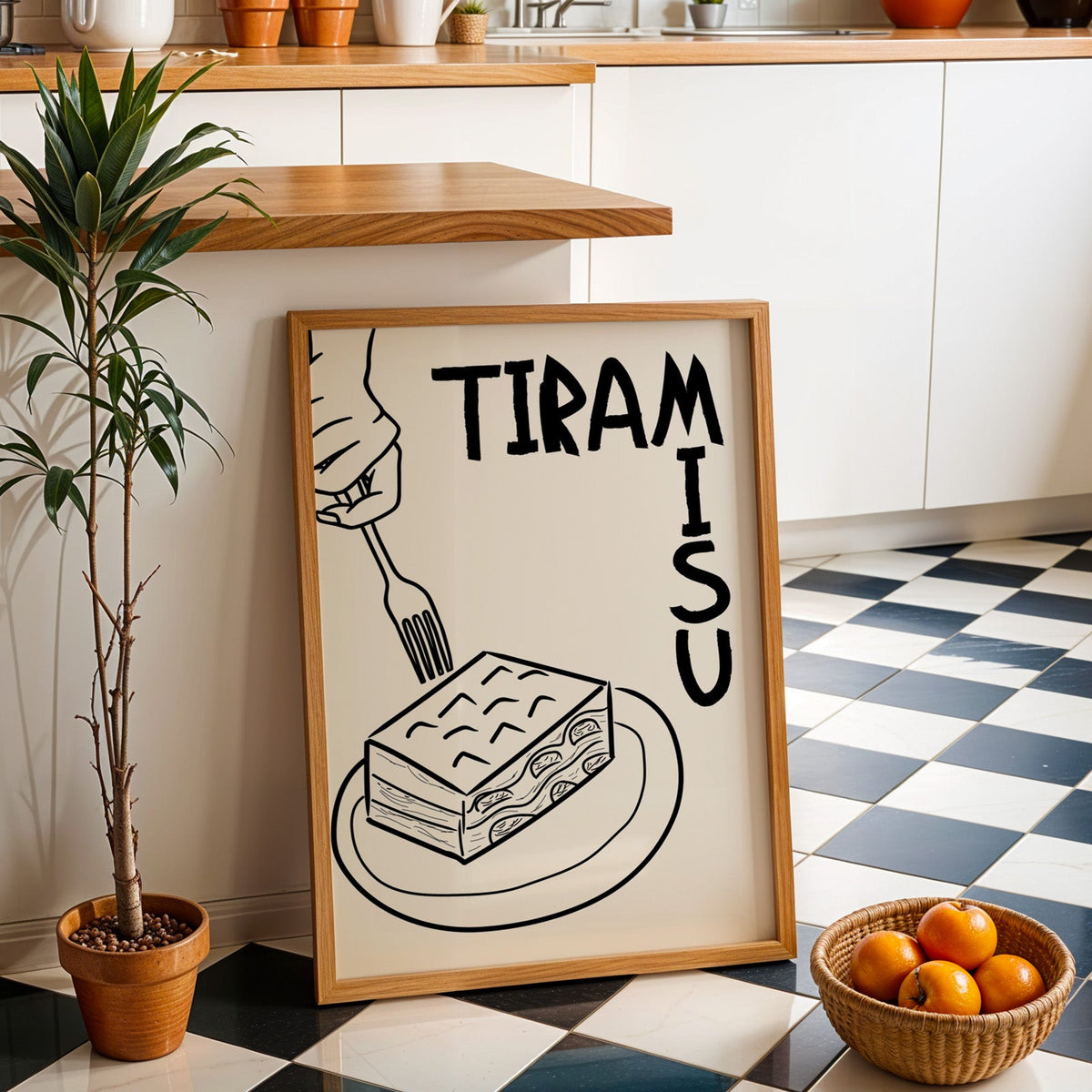 Tiramisu line art print in an oak frame by a kitchen island and checkered floor