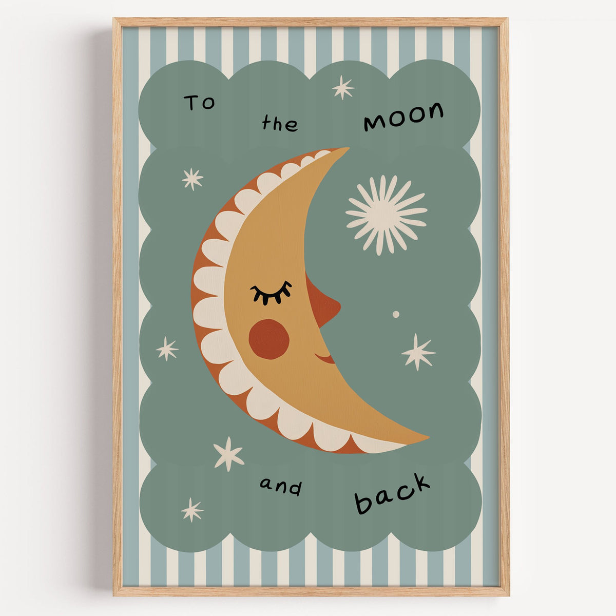 To the moon and back nursery print in a light oak frame on a plain white wall