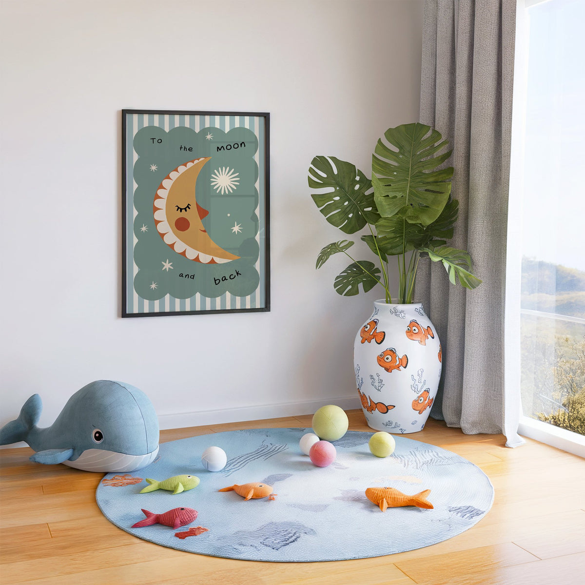 To the moon and back nursery print in a black frame in a playroom with an ocean rug and whale plush