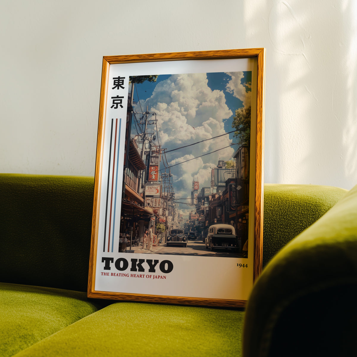 Vintage Tokyo 1944 street print in an oak frame propped on a green velvet sofa