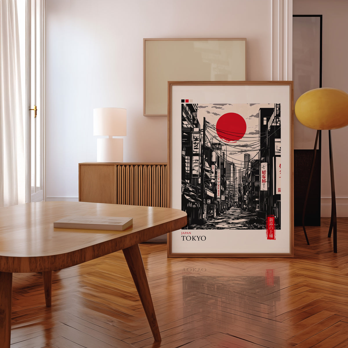 Tokyo ink street with red sun print in a walnut frame leaning in a mid-century living room