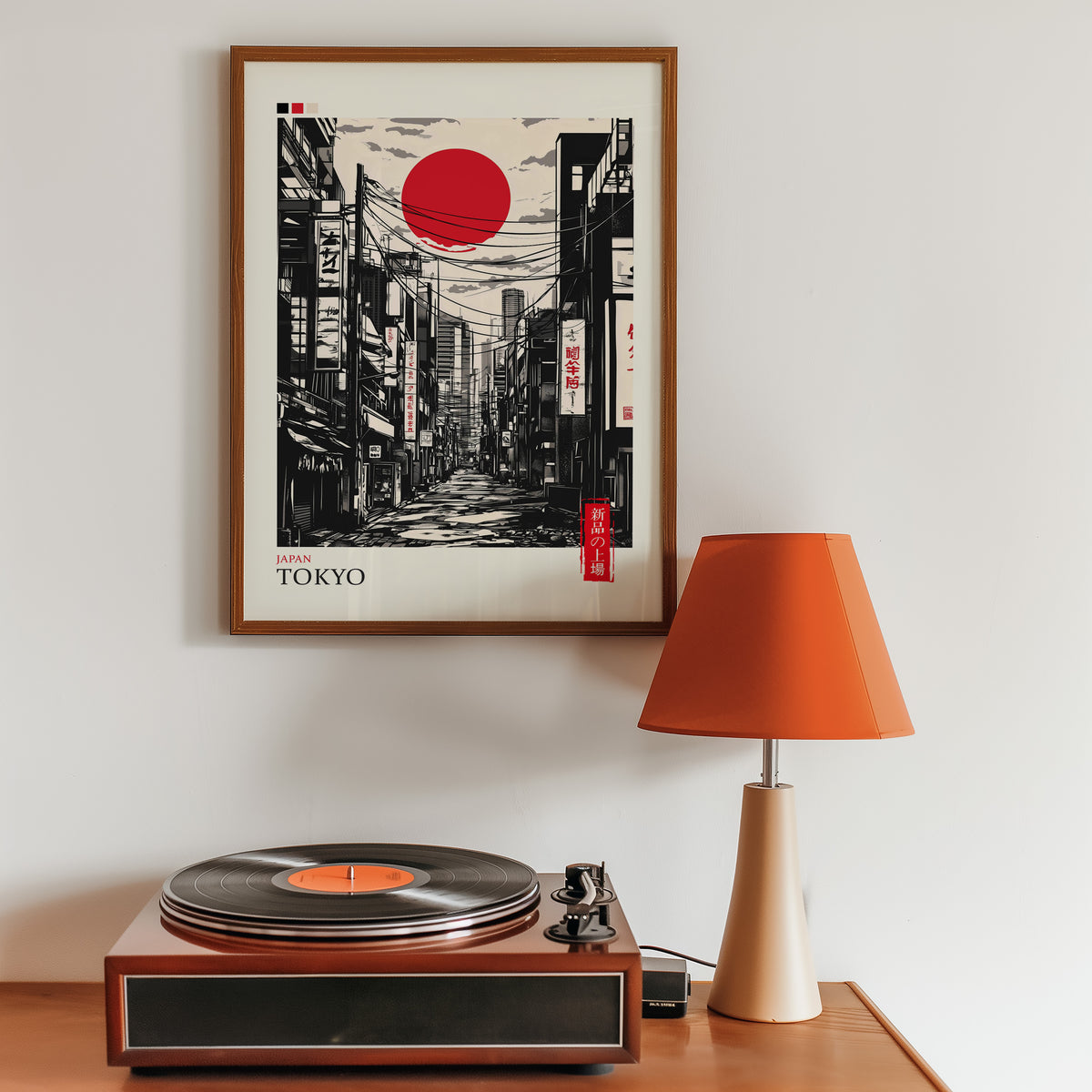 Tokyo ink street with red sun print in a walnut frame above a sideboard with a record player