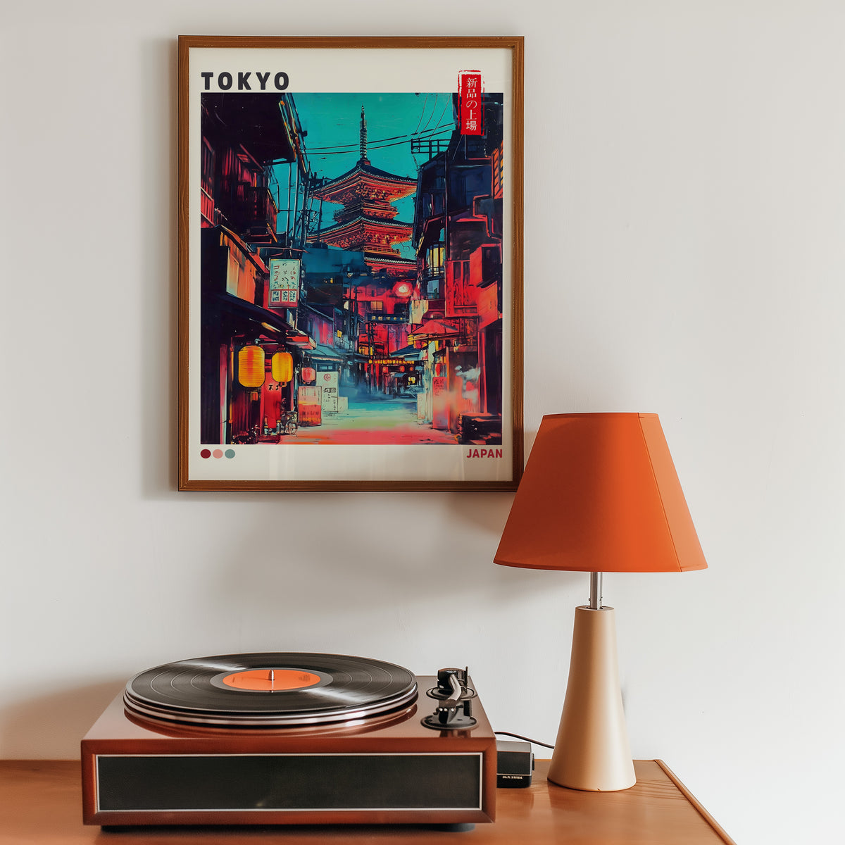 Tokyo neon alley and red pagoda print in a walnut frame above a sideboard with a record player
