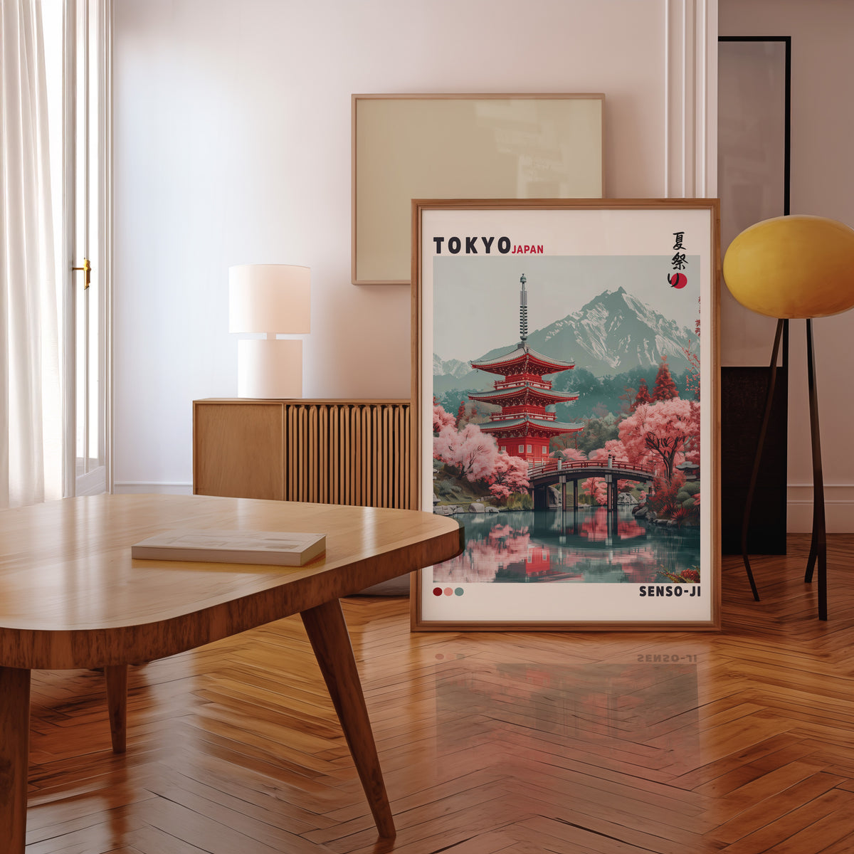 Red pagoda and arched bridge sakura print in a walnut frame leaning in a mid-century living room
