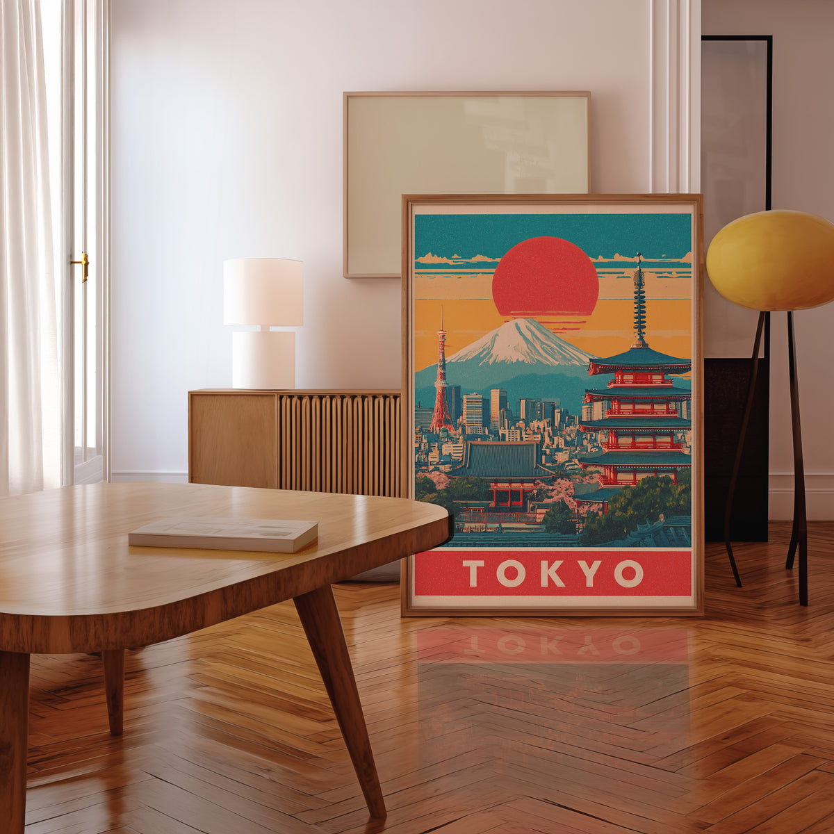 Retro Tokyo red sun skyline print in a walnut frame leaning in a mid-century living room