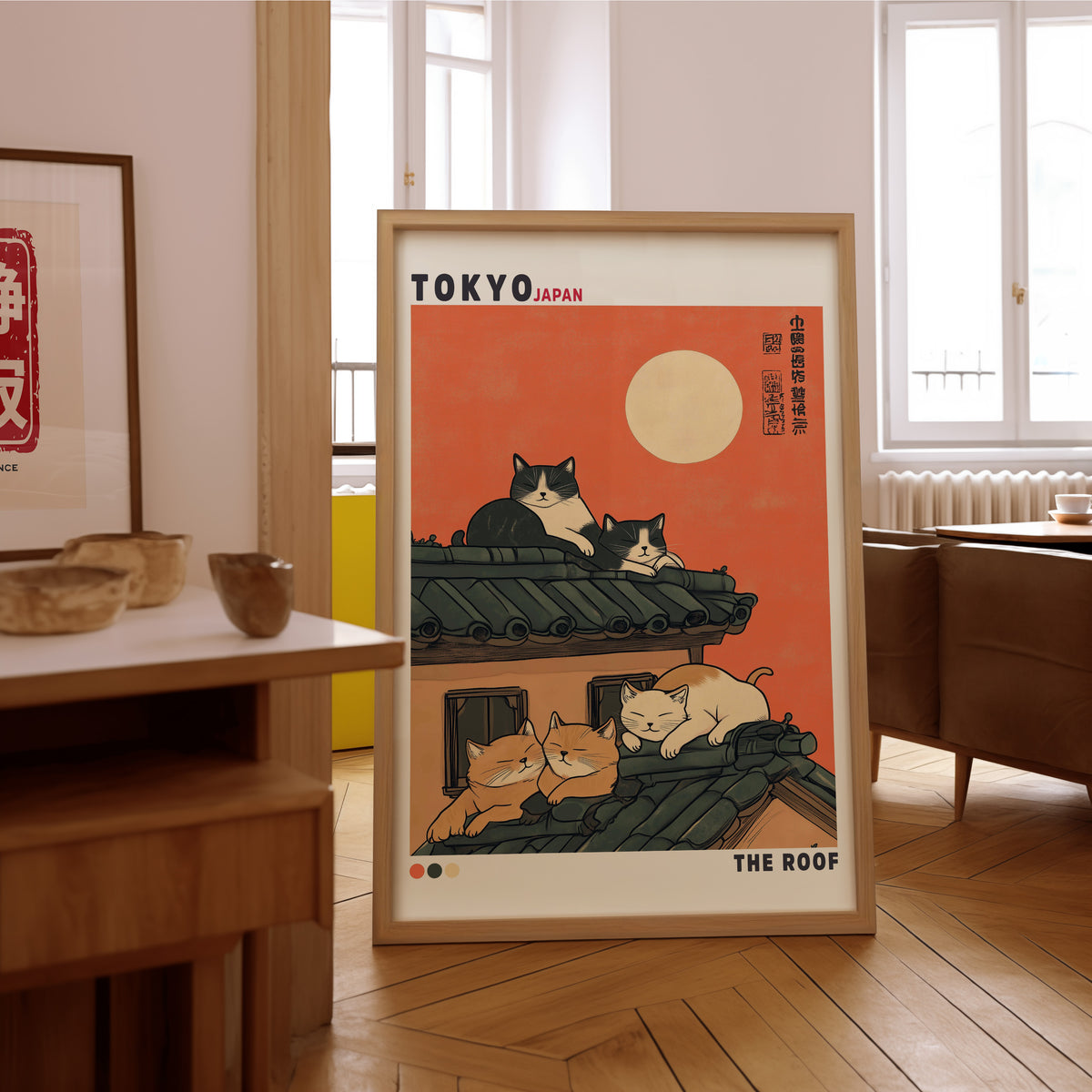 Five cats sleeping on Tokyo roof print in an oak frame on the parquet floor of a sunlit living room