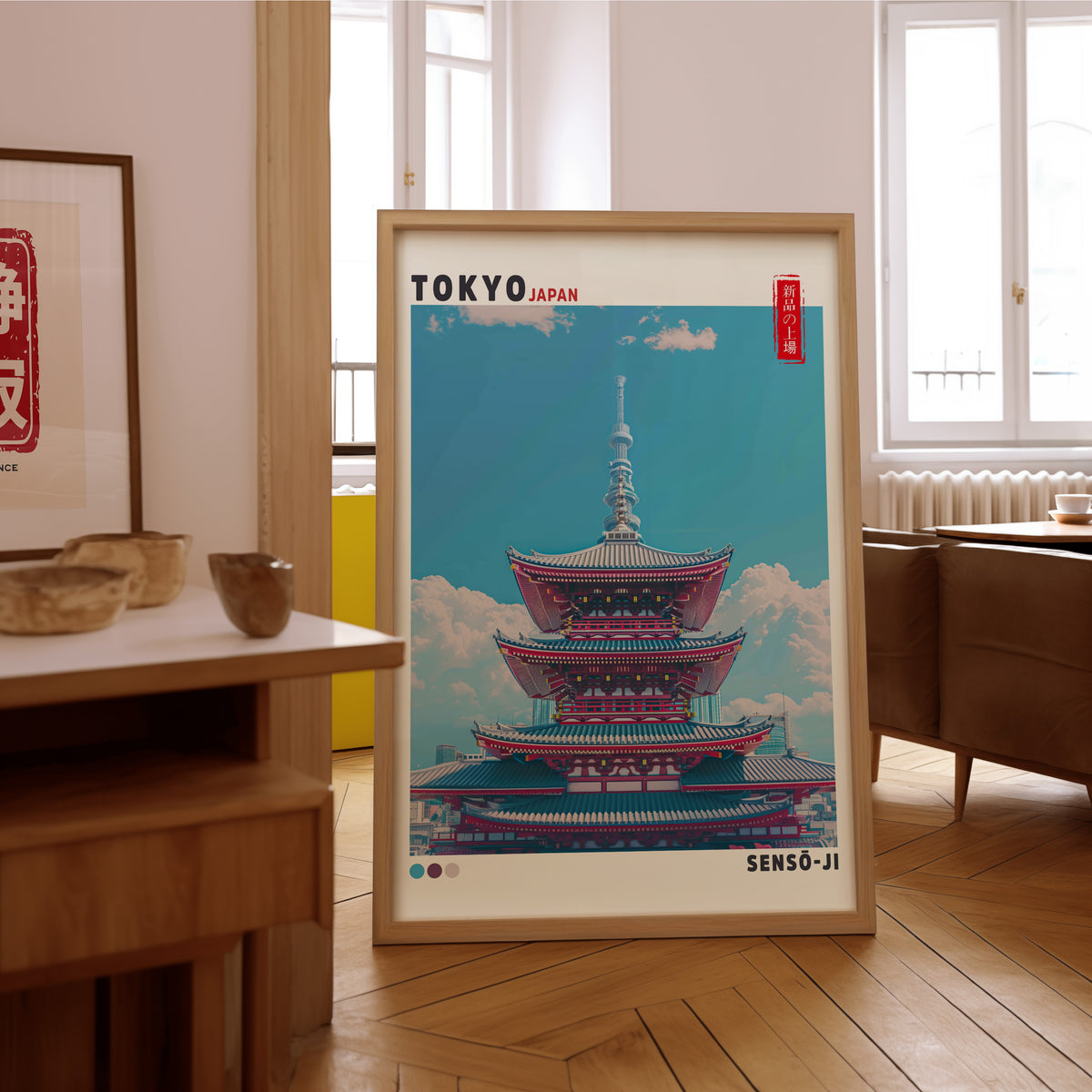 Senso-ji five-story pagoda print in an oak frame on the parquet floor of a sunlit living room