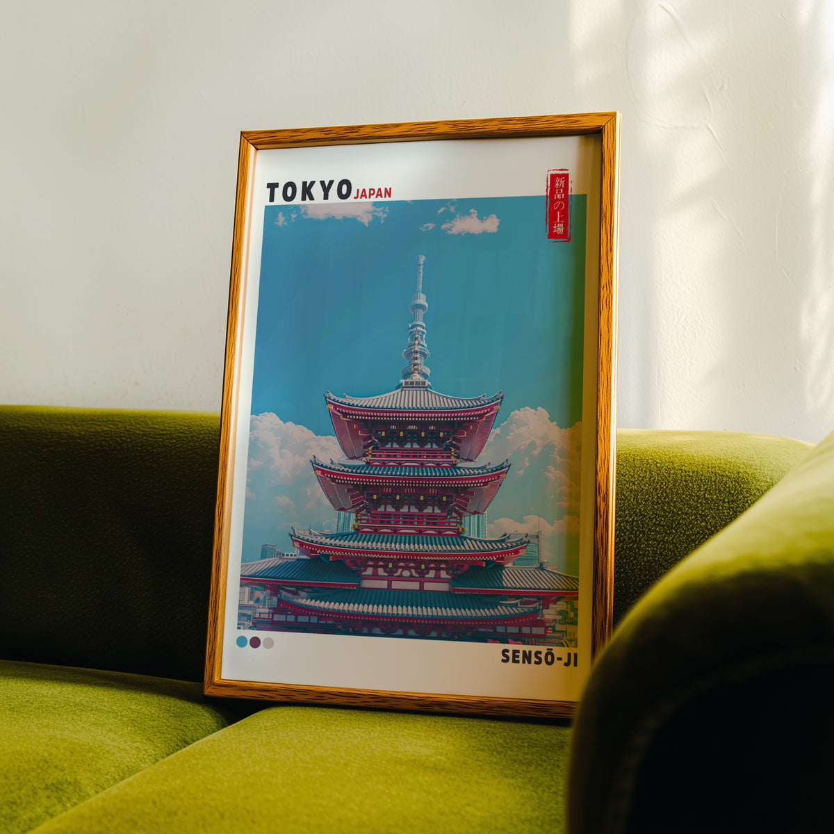 Senso-ji five-story pagoda print in an oak frame propped on a green velvet sofa
