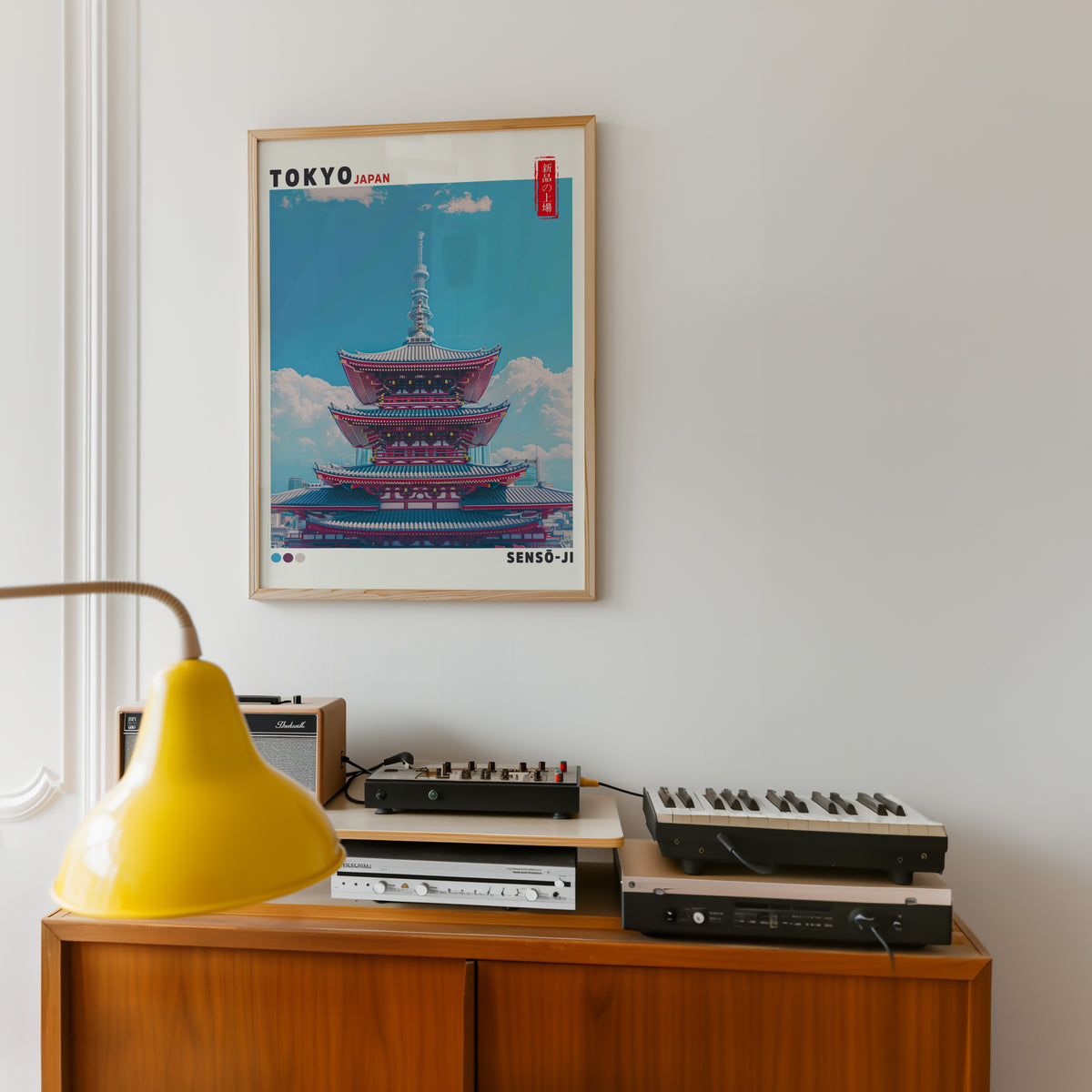Senso-ji five-story pagoda print in an oak frame above a teak sideboard with vintage hi-fi