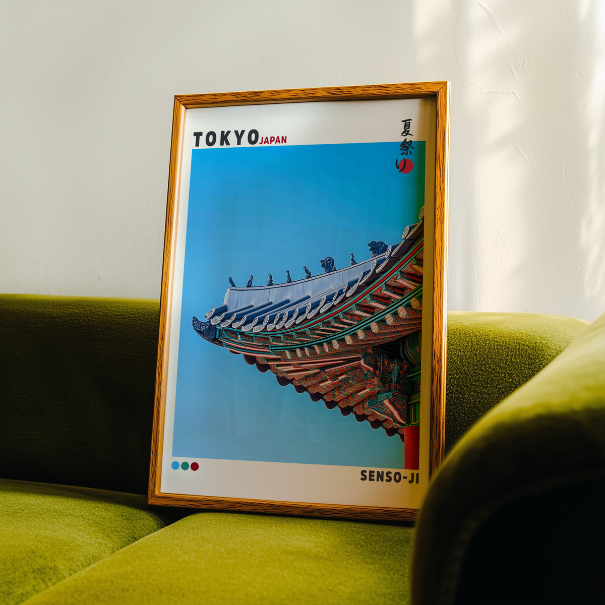 Senso-ji green temple roof detail print in an oak frame propped on a green velvet sofa