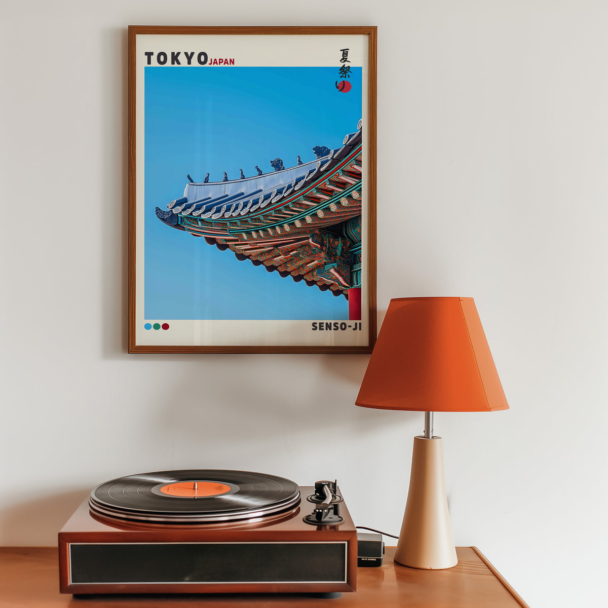 Senso-ji green temple roof detail print in a walnut frame above a sideboard with a record player