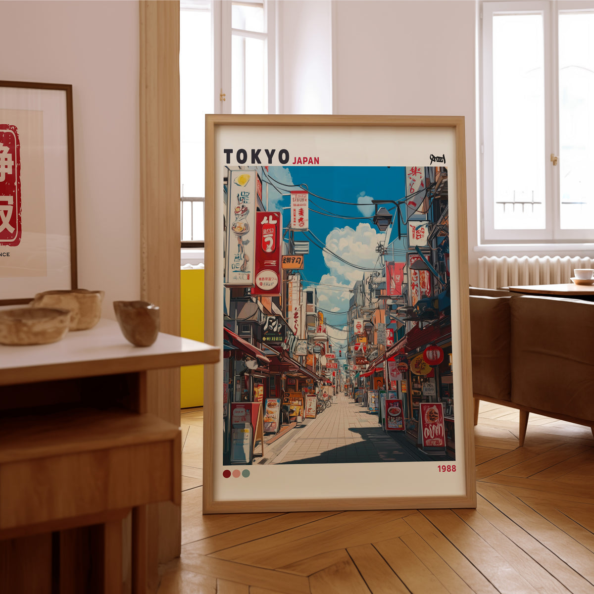 Tokyo shopping street 1988 print in an oak frame on the parquet floor of a sunlit living room
