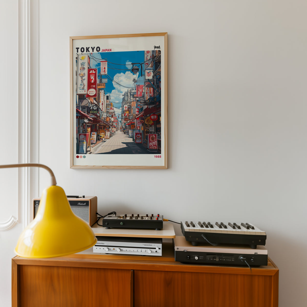 Tokyo shopping street 1988 print in an oak frame above a teak sideboard with vintage hi-fi