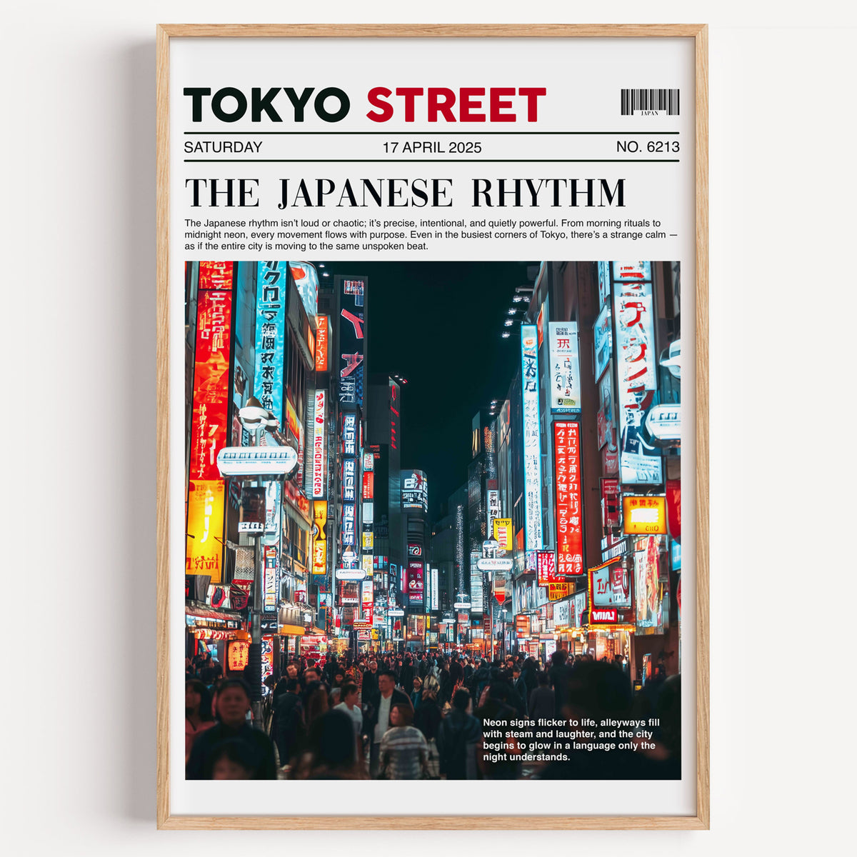 Tokyo street neon newspaper print in a light oak frame on a plain white wall