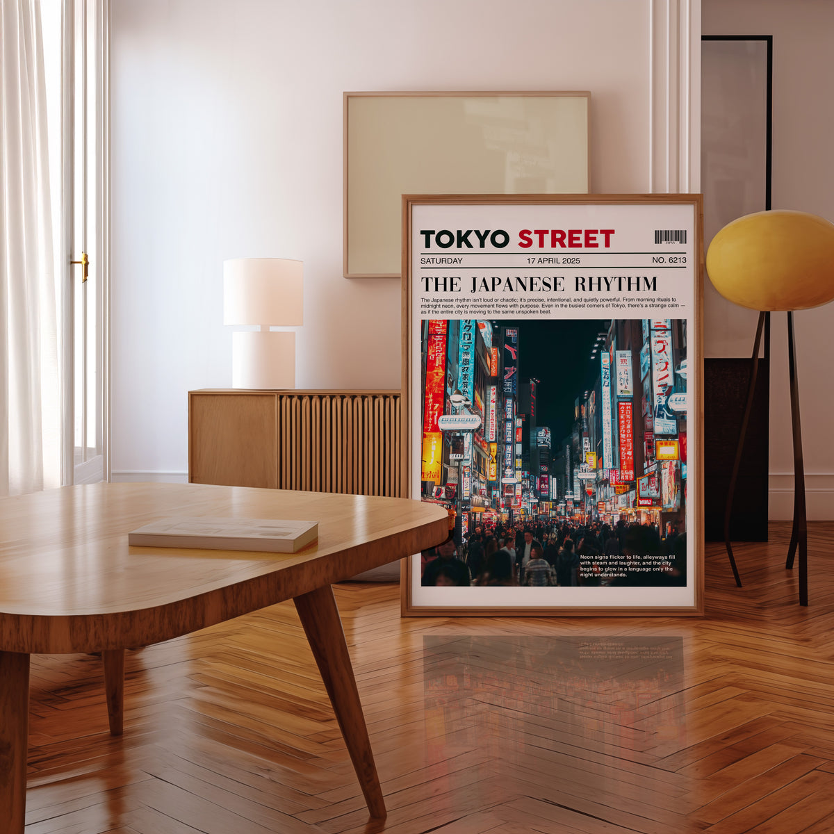 Tokyo street neon newspaper print in a walnut frame leaning in a mid-century living room
