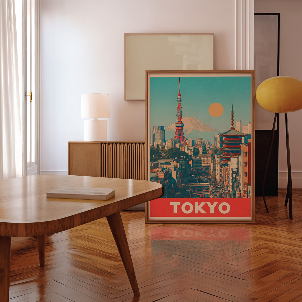 Retro Tokyo Tower and Mount Fuji print in a walnut frame leaning in a mid-century living room