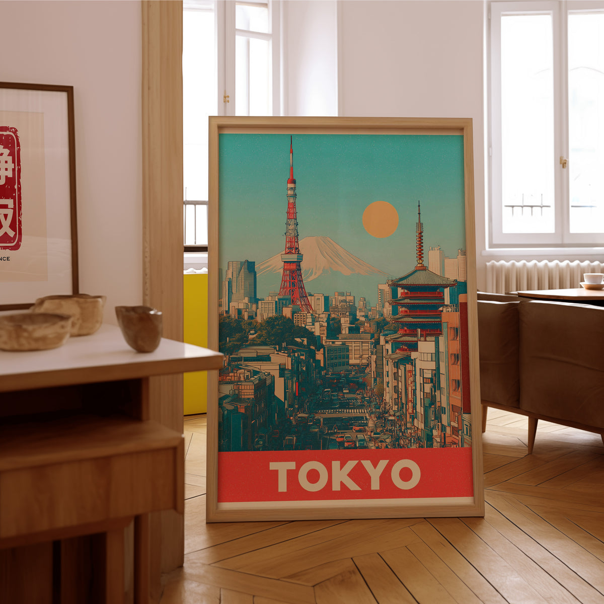 Retro Tokyo Tower and Mount Fuji print in an oak frame on the parquet floor of a sunlit living room