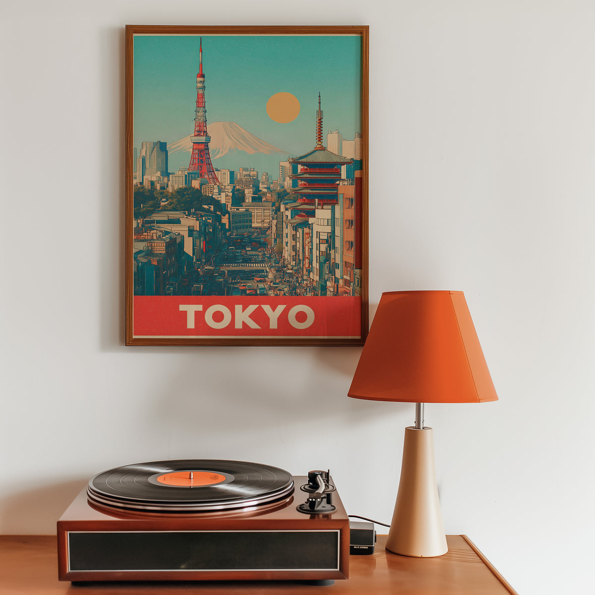 Retro Tokyo Tower and Mount Fuji print in a walnut frame above a sideboard with a record player