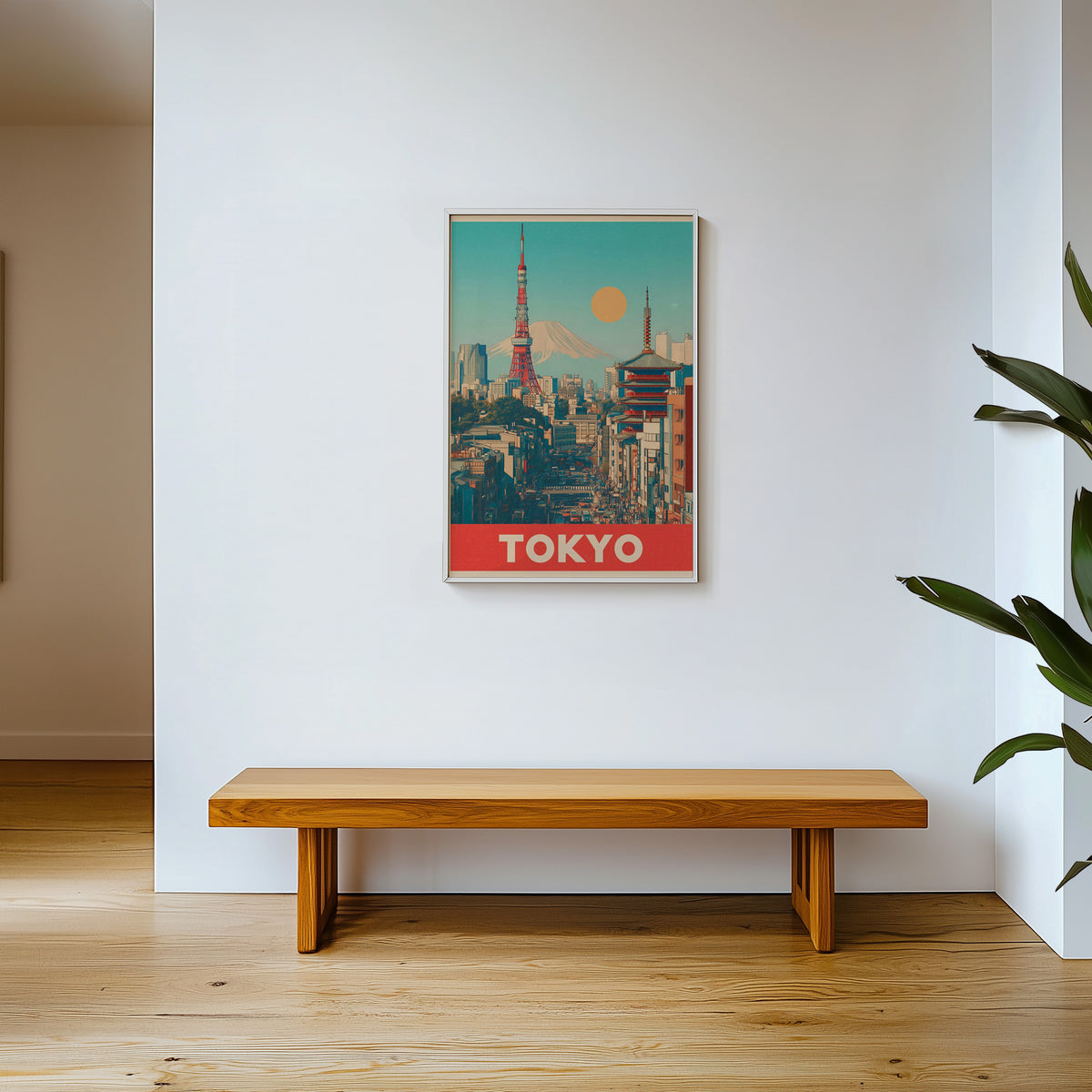Retro Tokyo Tower and Mount Fuji print shown in a white frame above a wooden entryway bench