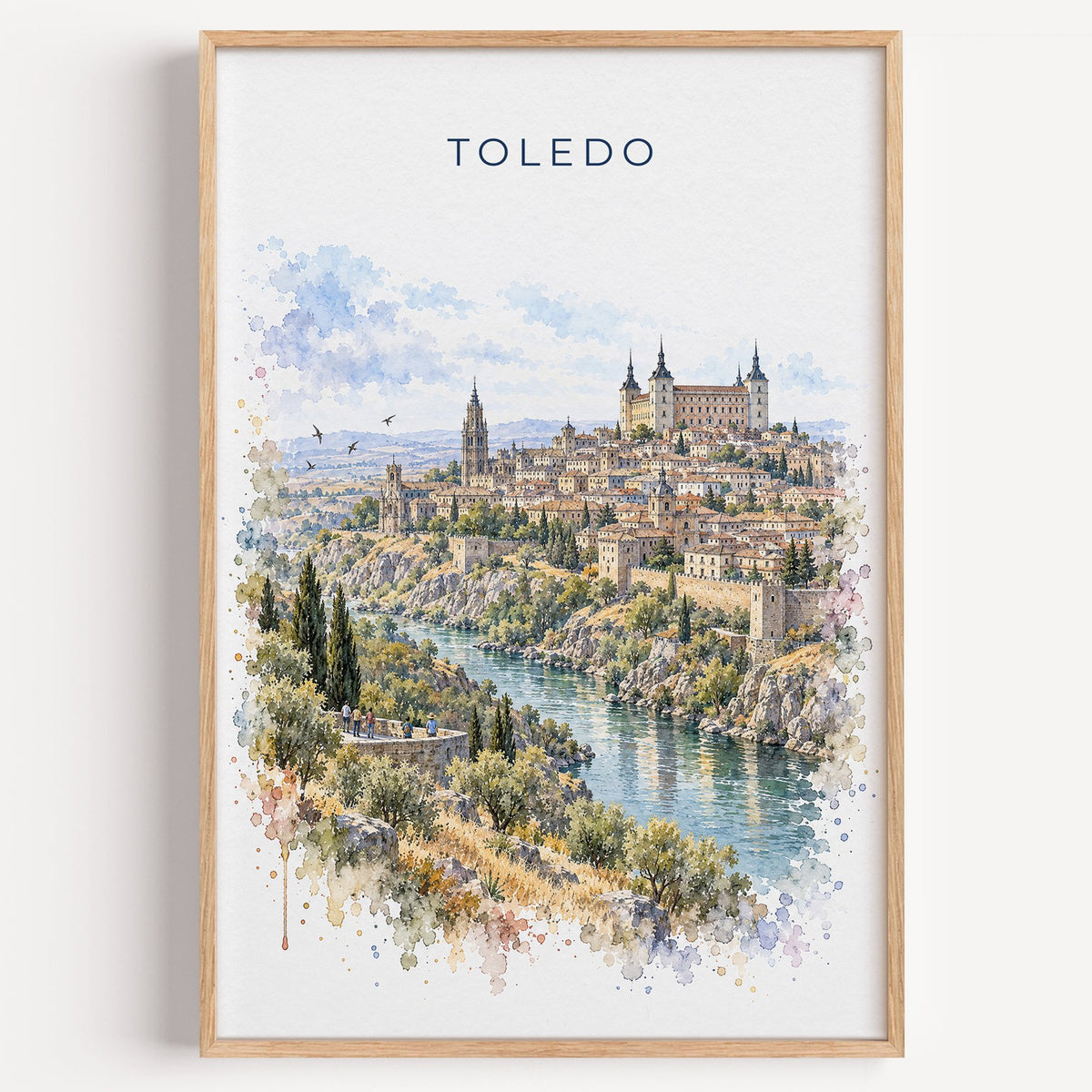 Toledo, Spain watercolor print in a light oak frame on a plain white wall