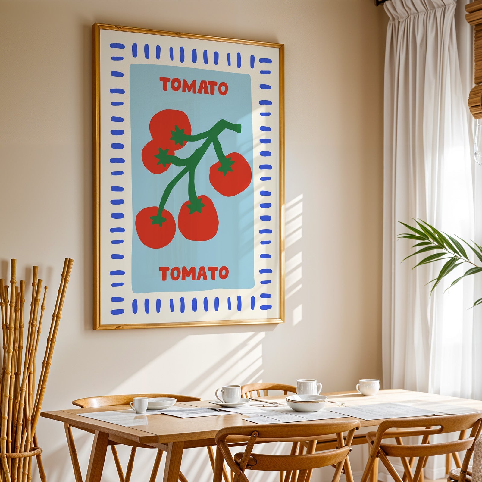 Tomato seed packet print in a gold frame above a sunlit breakfast table