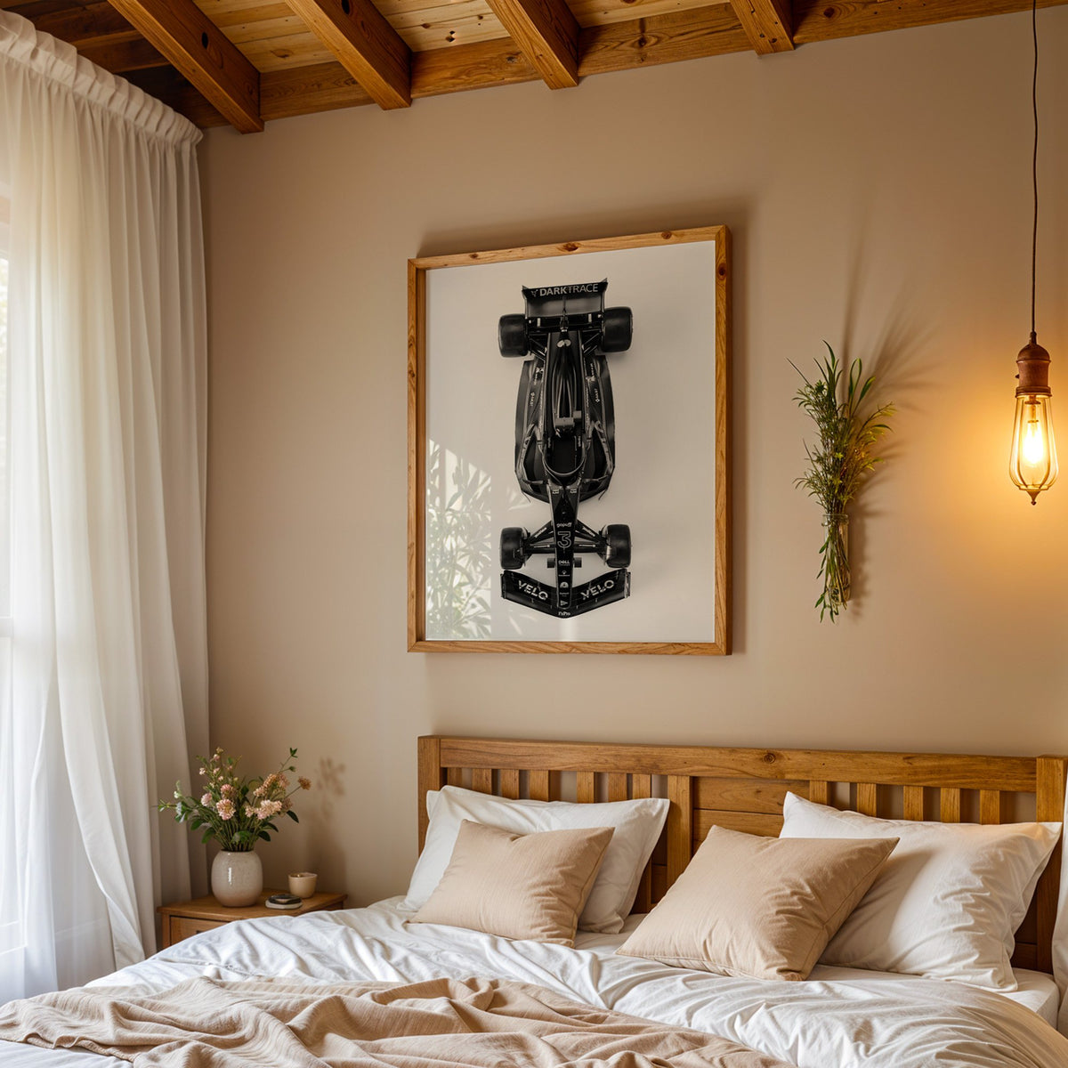 Top view black formula-style race car print in a pine frame above a wood headboard bed under a pendant bulb