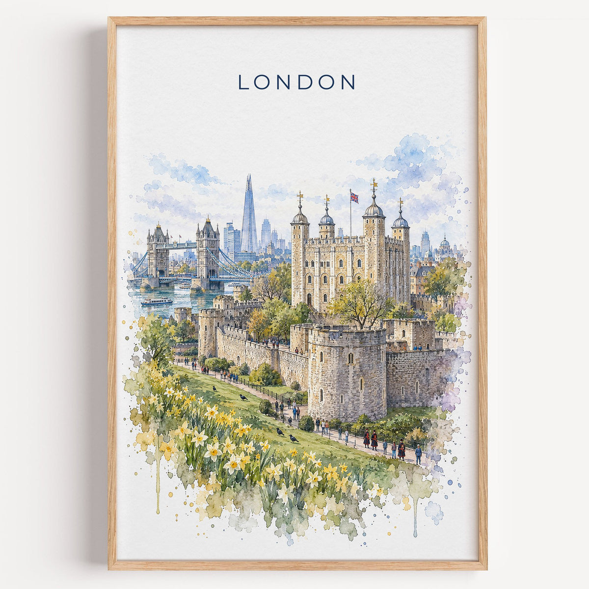 Tower of London watercolor print in a light oak frame on a plain white wall