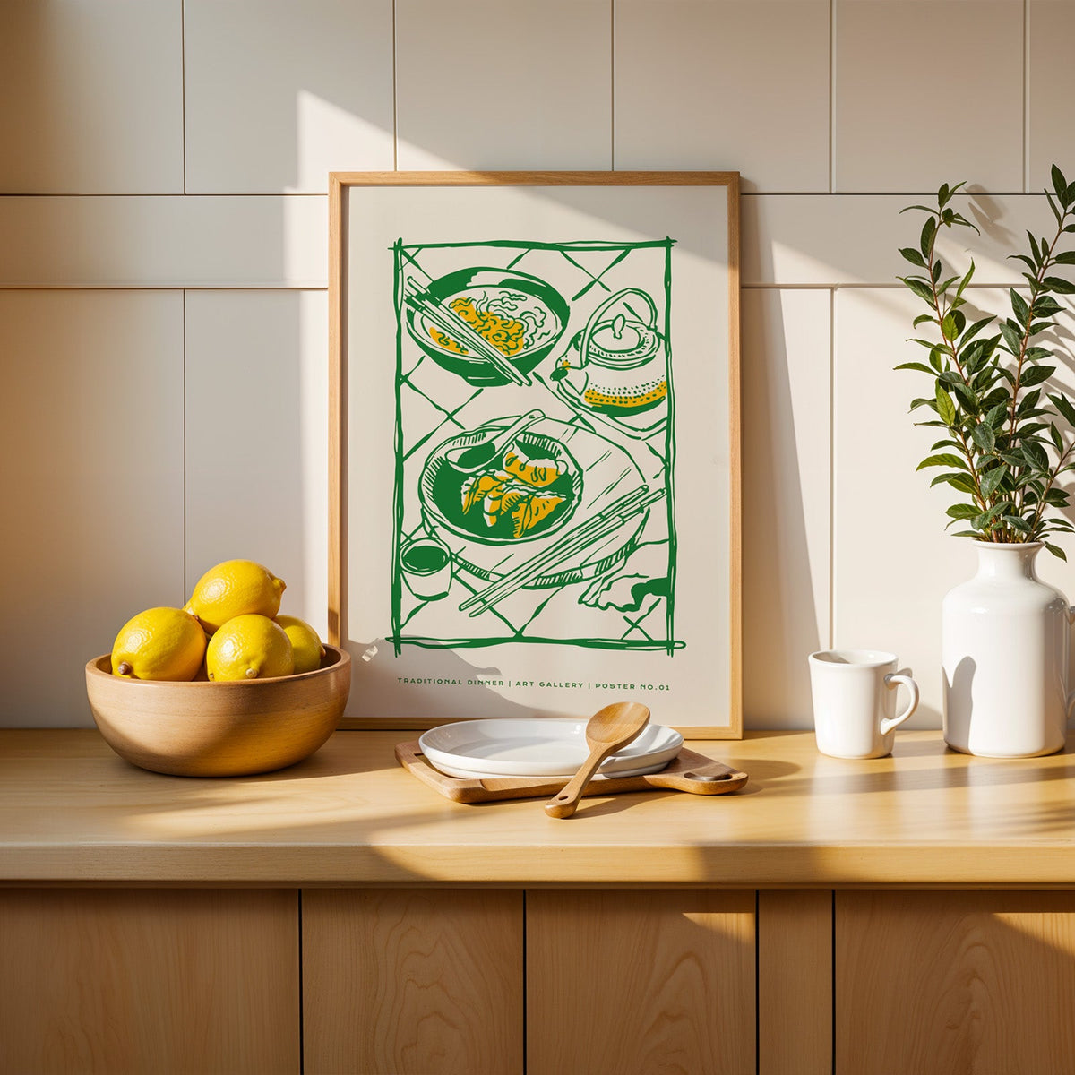 Traditional Dinner table print in a slim oak frame beside a wooden bowl of lemons