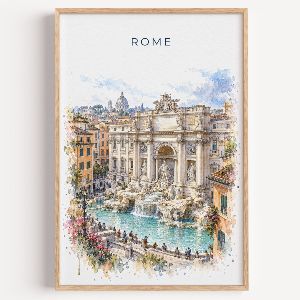 Trevi Fountain watercolor print in a light oak frame on a plain white wall