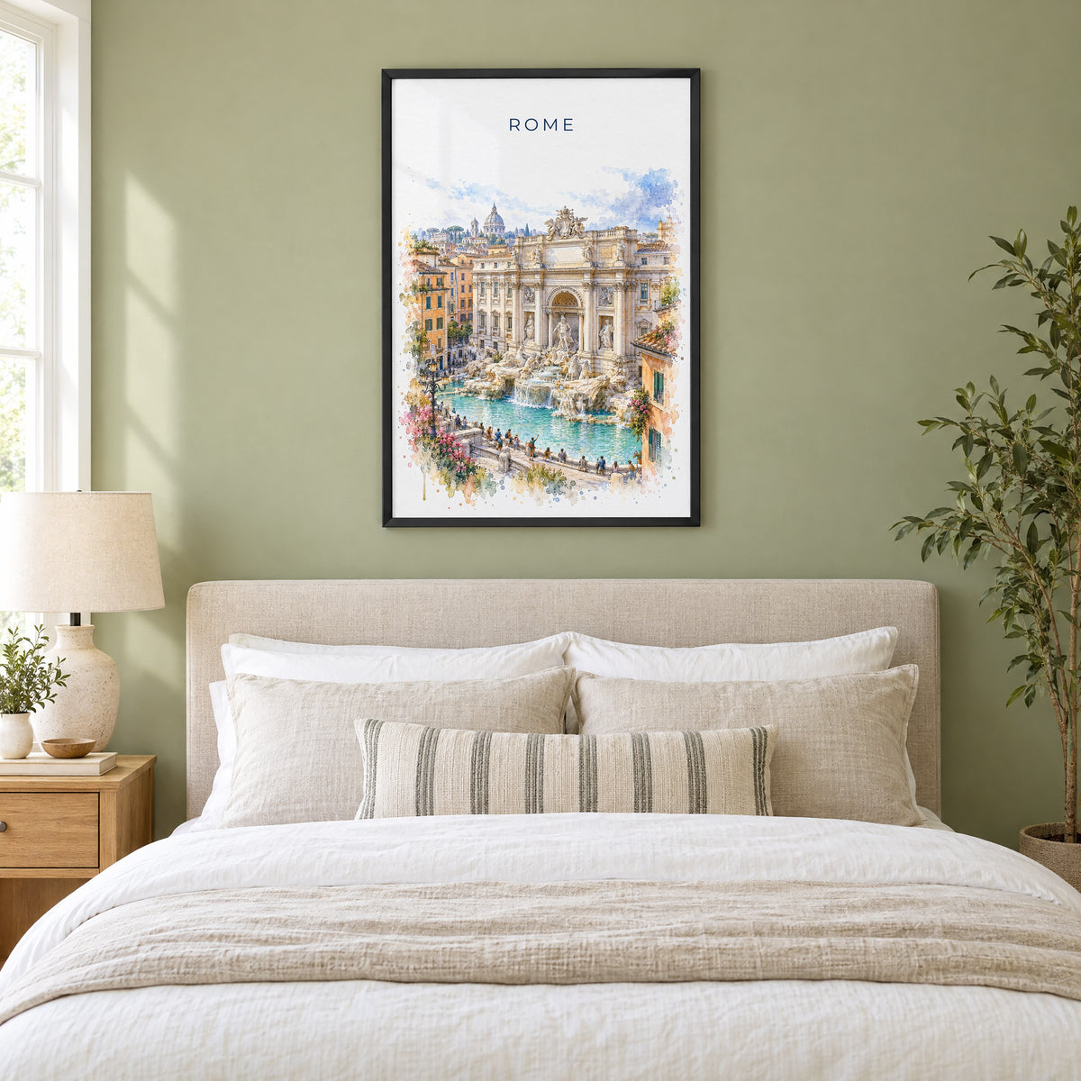 Trevi Fountain watercolor print in a black frame above an upholstered headboard in a sage green bedroom