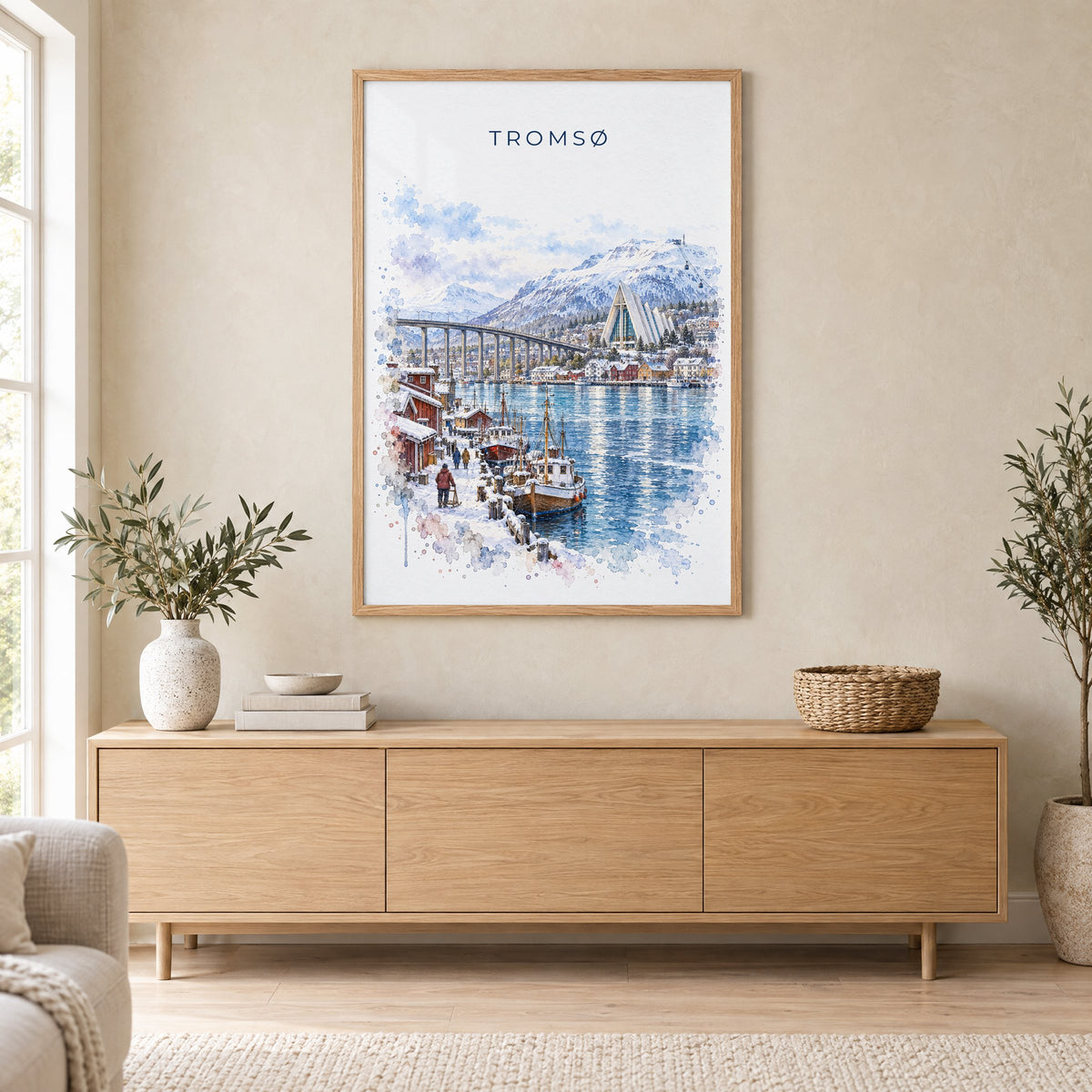 Tromsø, Norway watercolor print in an oak frame above a light wood sideboard in a Scandinavian living room