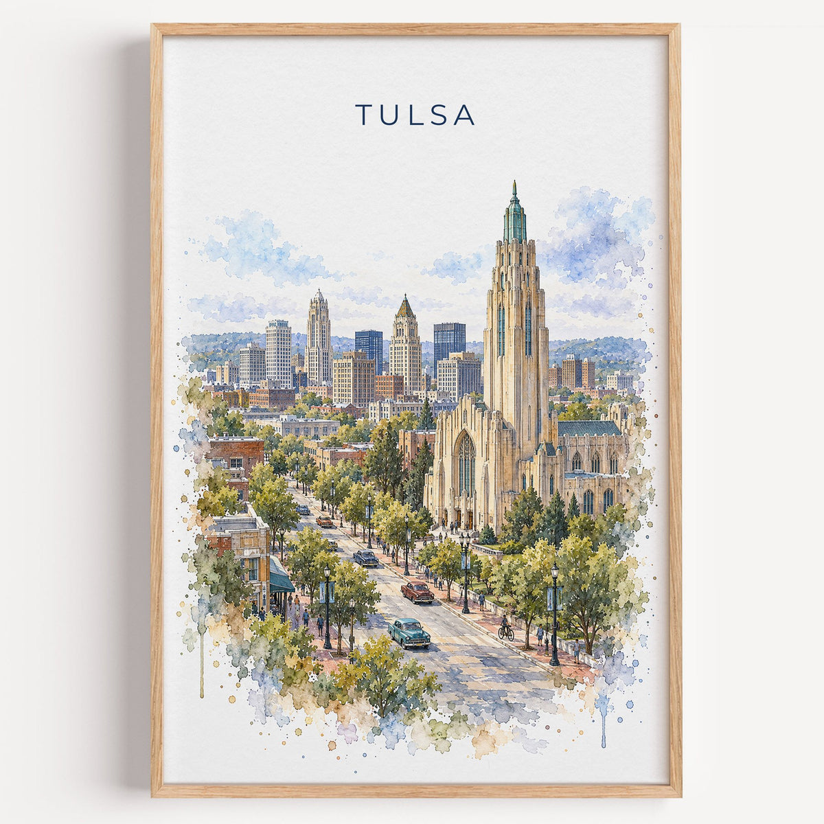 Tulsa watercolor print in a light oak frame on a plain white wall