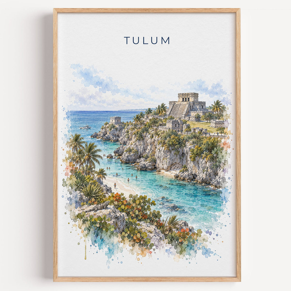 Tulum watercolor print in a light oak frame on a plain white wall