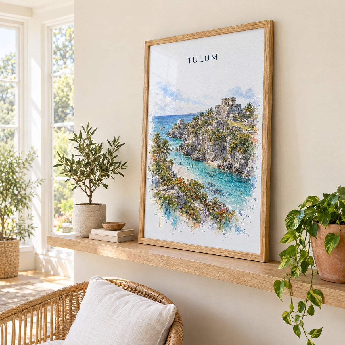 Tulum watercolor print in an oak frame on a picture ledge in a sunlit sunroom