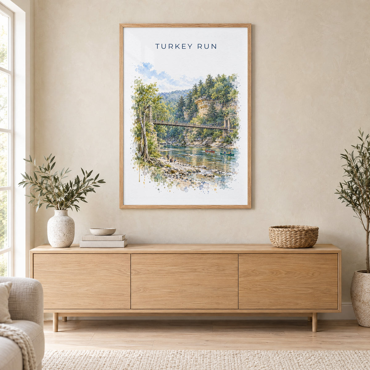 Turkey Run State Park watercolor print in an oak frame above a light wood sideboard in a Scandinavian living room