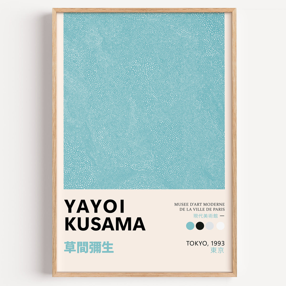 Yayoi Kusama inspired turquoise dotted texture print in a wood frame on a plain wall